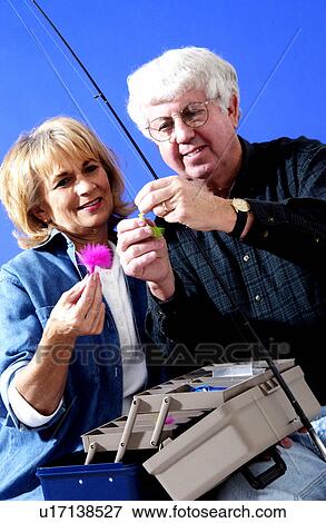Couple fishing View Large Photo Image Stock Photo - Couple fishing. Fotosearch