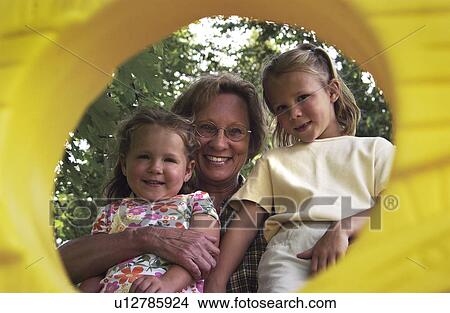 Picture - Grandma with grandchildren. Fotosearch