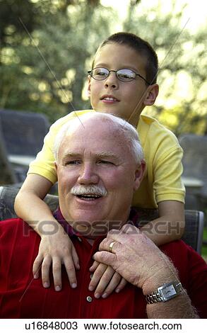 Grandpa with grandson View Large Photo Image Stock Image - Grandpa with grandson. Fotosearch