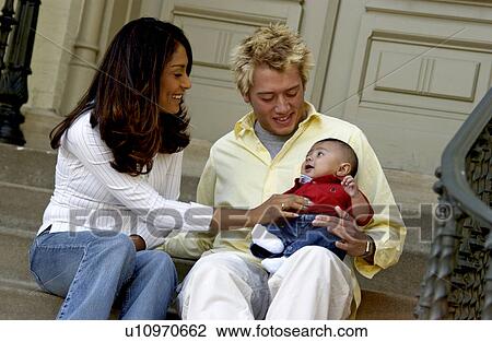 Stock Image - Parents with son. Fotosearch