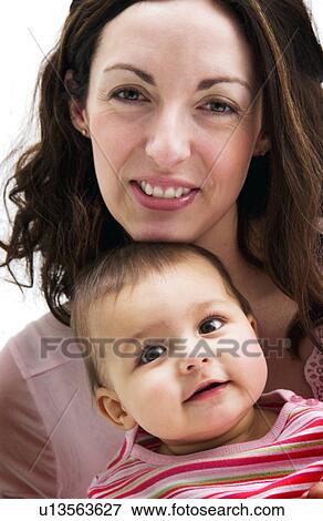 Stock Photo - Portrait of mother and daughter. Fotosearch