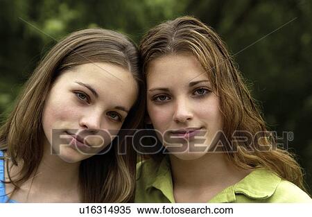 Stock Photography - Portrait of two teen girls. Fotosearch
