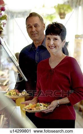 Senior couple at restaurant View Large Photo Image Stock Image - Senior couple at restaurant. Fotosearch