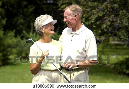 Senior couple golfing View Large Photo Image Stock Image - Senior couple golfing. Fotosearch
