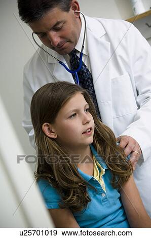 Girl getting physical View Large Photo Image Stock Photo - Girl getting physical. Fotosearch