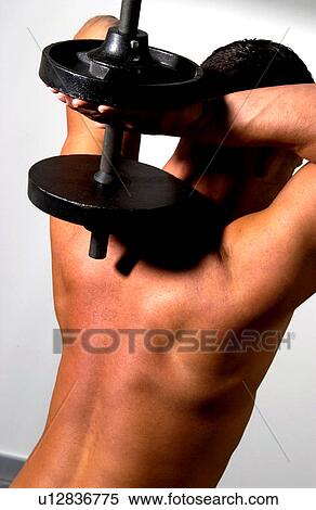 Man with barbell View Large Photo Image Stock Photography - Man with barbell. Fotosearch