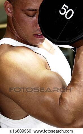 Man working out View Large Photo Image Stock Image - Man working out. Fotosearch