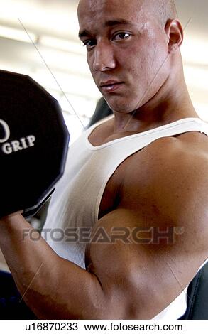 Stock Image - Man working out. Fotosearch