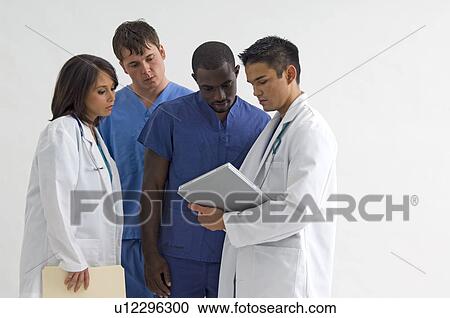 Stock Image - Portrait of doctors. Fotosearch