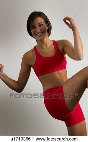 Stock Image - Woman exercising. Fotosearch