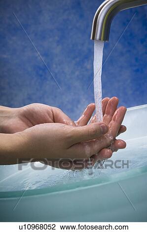 Woman washing hands View Large Photo Image Stock Image - Woman washing hands. Fotosearch