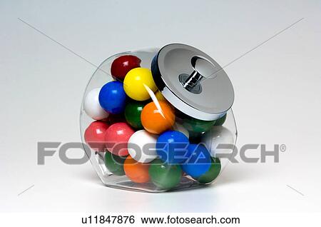 Stock Photograph - Candy in glass container. Fotosearch