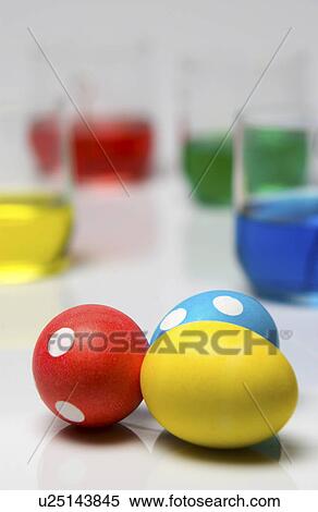 Dyeing Easter eggs View Large Photo Image Stock Photography - Dyeing Easter eggs. Fotosearch