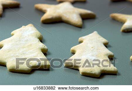 Stock Image - Sheet of Christmas cookies. Fotosearch