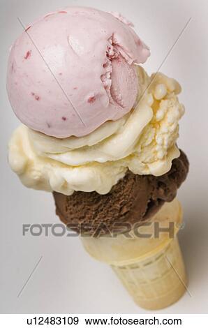 Stock Photo - Triple dip ice cream cone. Fotosearch