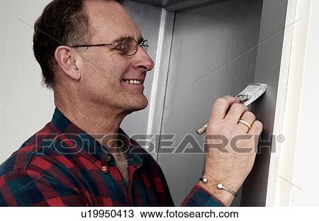 Man painting View Large Photo Image Stock Image - Man painting. Fotosearch