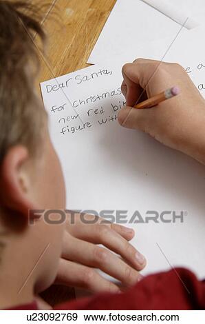 Boy writing letter to Santa View Large Photo Image Stock Photo - Boy writing letter to Santa. Fotosearch