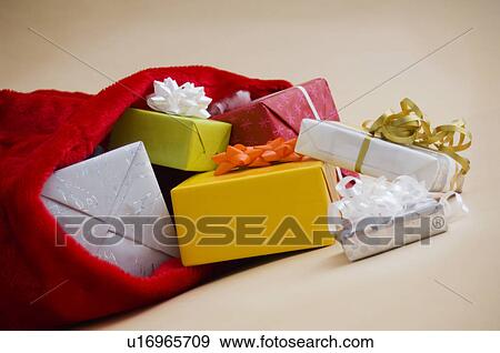 Stock Photo - Santa bag full of gifts. Fotosearch