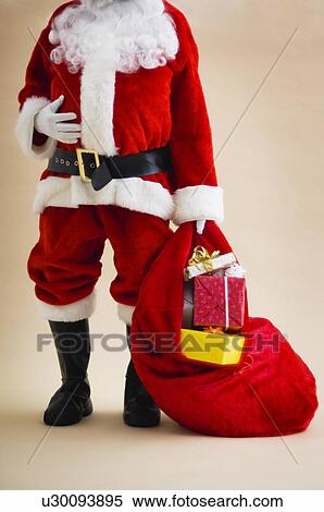 Santa with bag of gifts View Large Photo Image Stock Photography - Santa with bag of gifts. Fotosearch