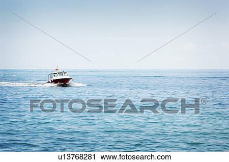 Stock Image - Boat on water. Fotosearch