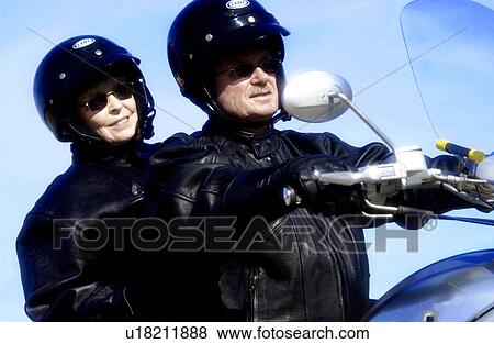 Couple on motorcycle View Large Photo Image Stock Photo - Couple on motorcycle. Fotosearch
