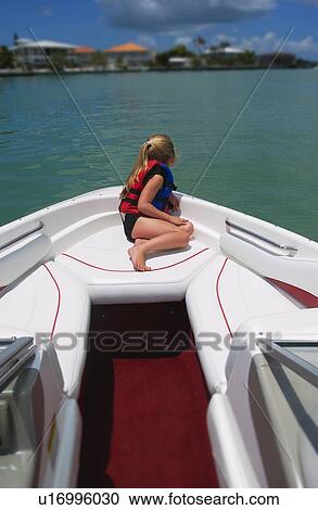 Girl riding in boat View Large Photo Image Stock Image - Girl riding in boat. Fotosearch