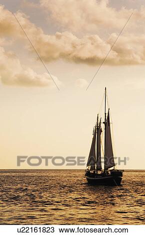 Sailboat on water View Large Photo Image Stock Image - Sailboat on water. Fotosearch