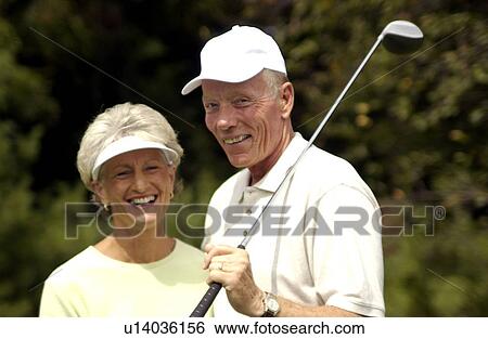 Senior couple golfing View Large Photo Image Stock Photograph - Senior couple golfing. Fotosearch