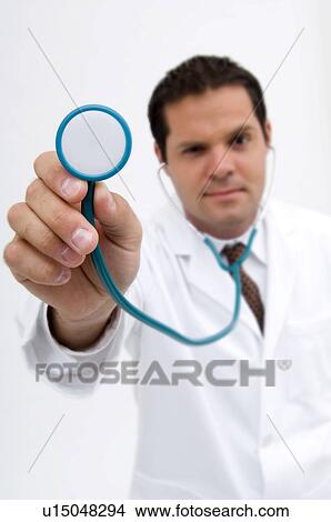 Doctor with stethoscope View Large Photo Image Picture - Doctor with stethoscope. Fotosearch