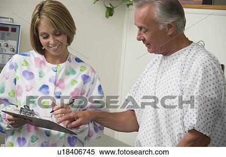 Stock Photography - Nurse and patient. Fotosearch