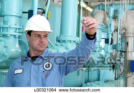 Picture - Water Department technician. Fotosearch