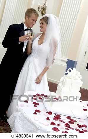 Bride and groom at reception View Large Photo Image Stock Image - Bride and groom at reception. Fotosearch