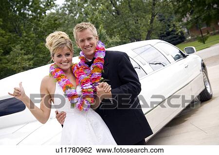 Bride and groom by limo View Large Photo Image Stock Image - Bride and groom by limo. Fotosearch