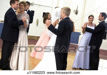 Stock Image - Bride and groom dancing. Fotosearch