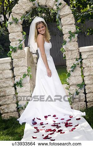 Bride standing in aisle View Large Photo Image Picture - Bride standing in aisle. Fotosearch