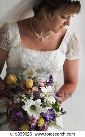 Bride with bouquet View Large Photo Image Stock Photograph - Bride with bouquet. Fotosearch