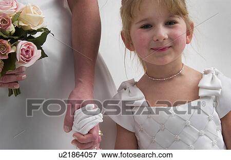 Stock Photo - Flower girl and bride. Fotosearch