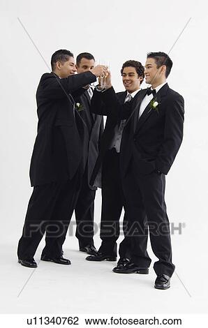 Stock Image - Groom with wedding party. Fotosearch