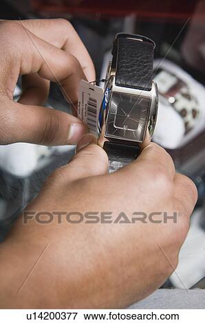Man shopping for a watch View Large Photo Image Stock Photo - Man shopping for a watch. Fotosearch