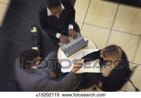 Stock Photo - Business meeting. Fotosearch
