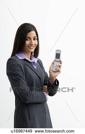 Stock Photo - Businesswoman with cell phone. Fotosearch