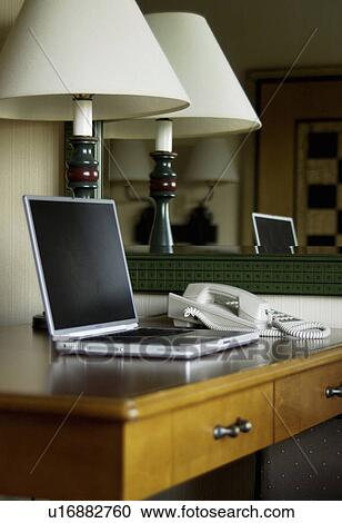 Desk with laptop View Large Photo Image Stock Image - Desk with laptop. Fotosearch