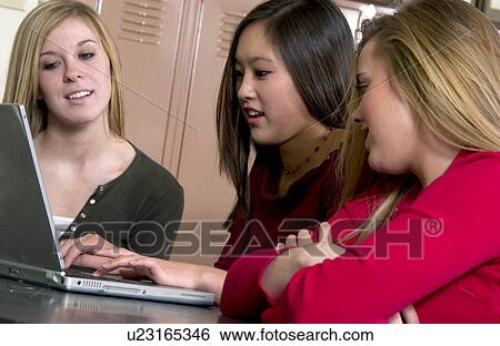 Students working on laptop View Large Photo Image Stock Photograph - Students working on laptop. Fotosearch