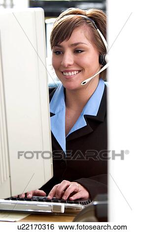 Stock Photograph - Woman at computer. Fotosearch