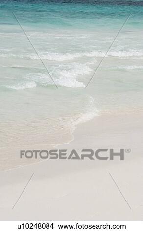 Picture - Ocean waves coming ashore. Fotosearch