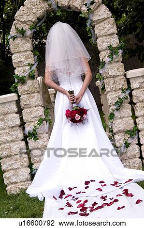 Bride standing in aisle View Large Photo Image Stock Image - Bride standing in aisle. Fotosearch