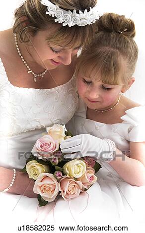 Stock Photography - Flower girl and bride. Fotosearch
