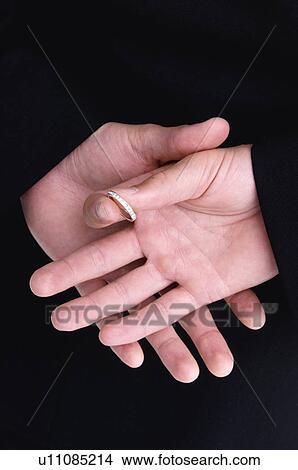 Groom with ring behind back View Large Photo Image Picture - Groom with ring behind back. Fotosearch