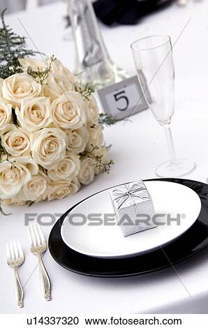 Stock Image - Wedding reception formal place setting. Fotosearch