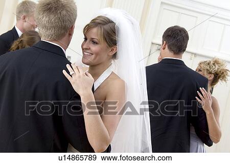 Stock Photo - Bride and groom dancing. Fotosearch